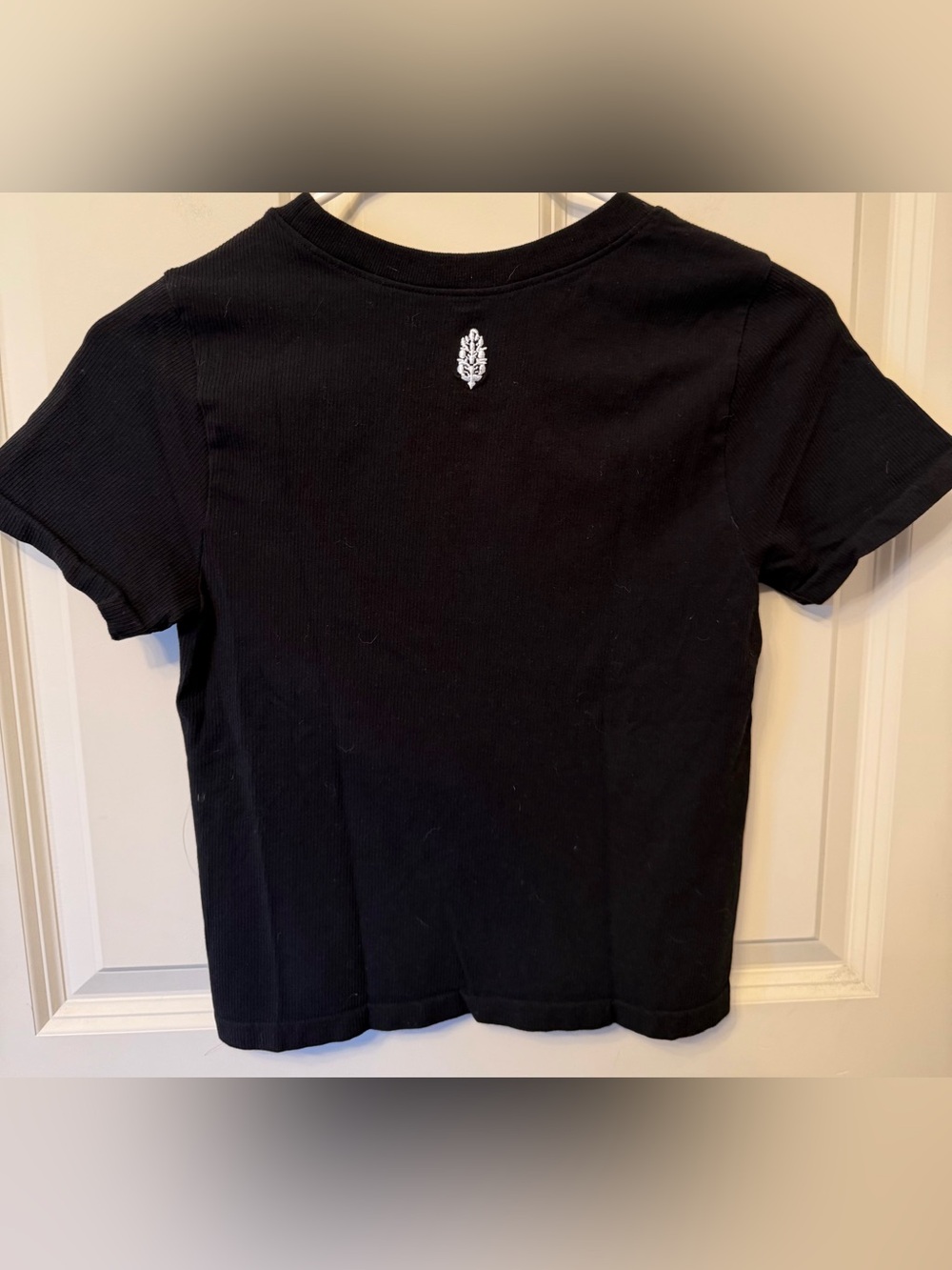 FP Movement Ribbed Stretch Baby Tee in Black, Size M/L